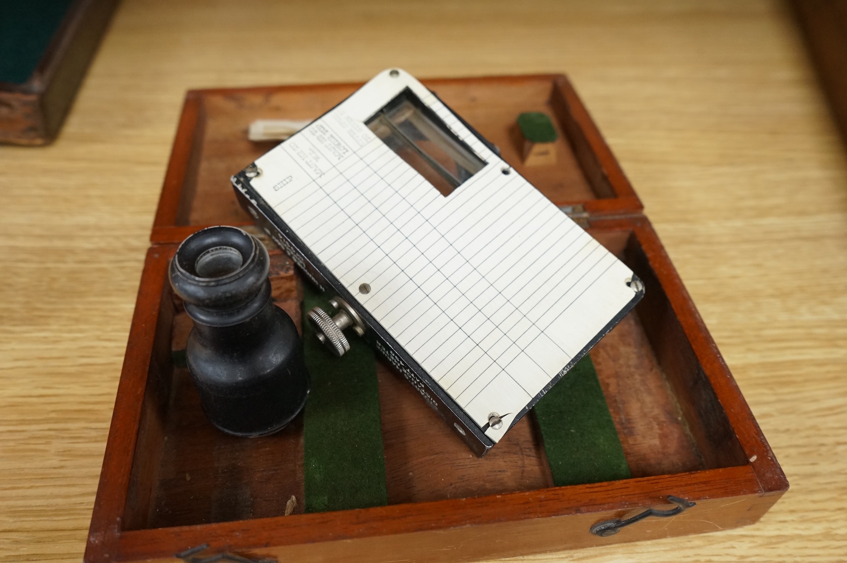 An early 20th century teak cased Stuart's Distance Meter and a late 19th century mahogany cased ‘Capt. Field’s Improved’ protractor by Gieves Ltd., 21 Old Bond Street W.1.
